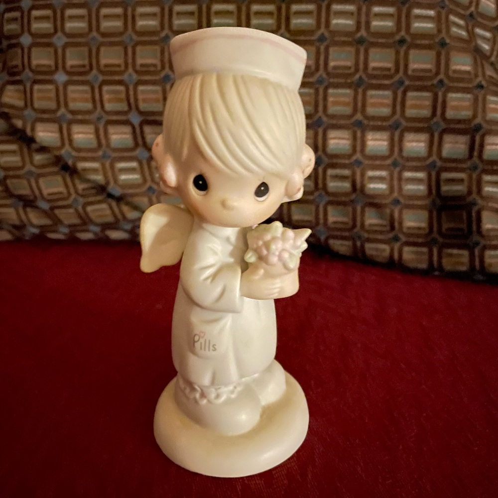Precious Moments Angel of Mercy
